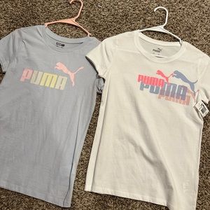 Two brand new girls puma shirts XL